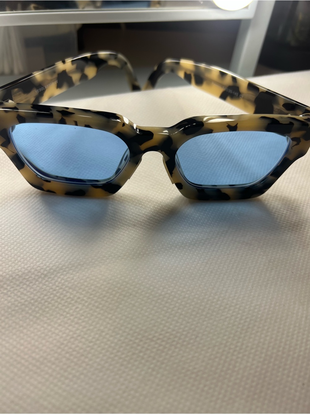 Tortoiseshell Cat-Eye Sunglasses with Light Blue Lenses